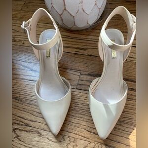 Nude closed toed heels